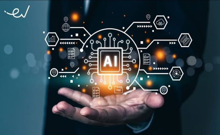 An image of a hand holding an ai icon.