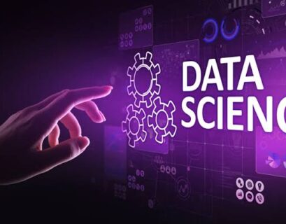 A hand pointing to the word data science on a purple screen during STEM Education.