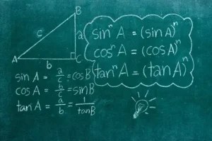 A blackboard with math formulas on it.