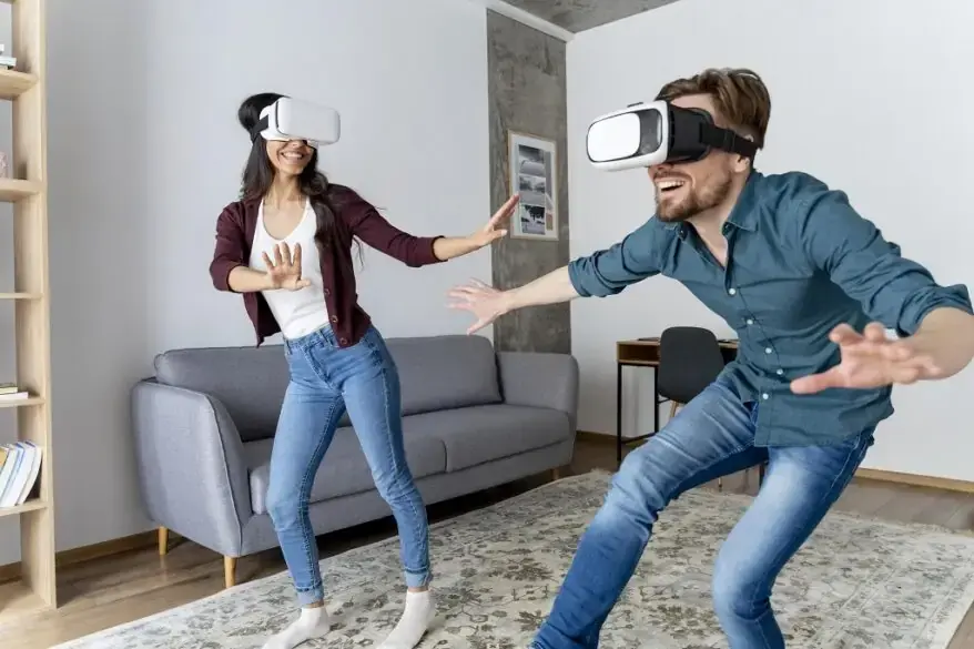 man-woman-play-with-virtual-reality-headset-home-together