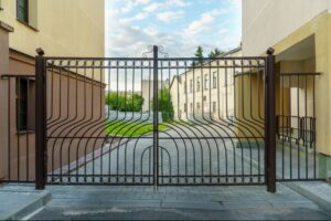 Closed metal gate between two buildings